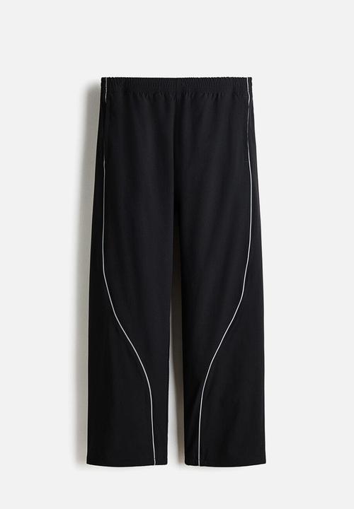 H&M - Relaxed fit track pants - black