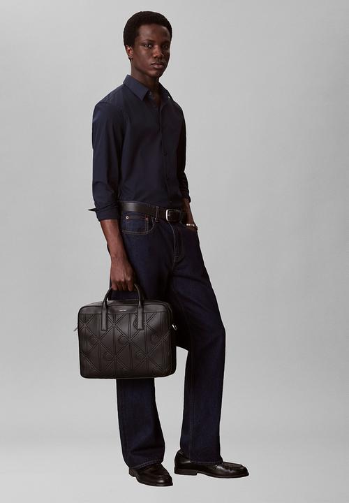 Calvin Klein - Emblem Aop Emboss Commuter - Black