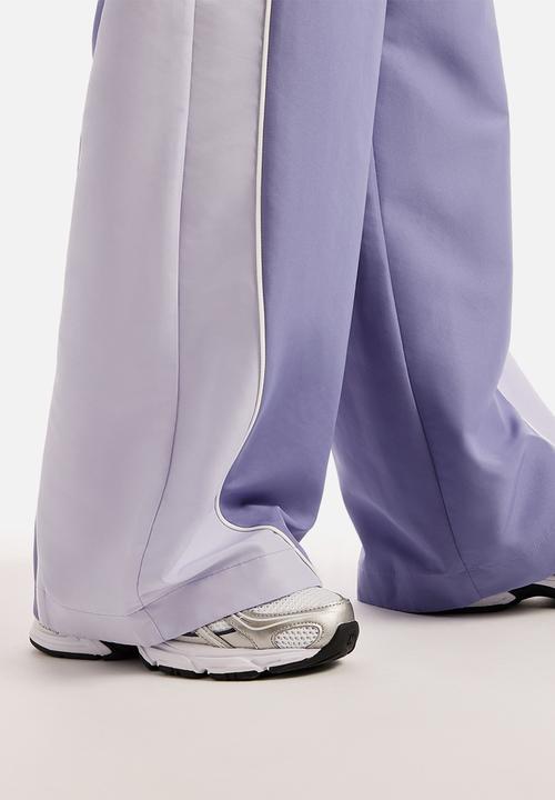 New Balance  - New Balance Trackside Pant - Dark Smoked Violet
