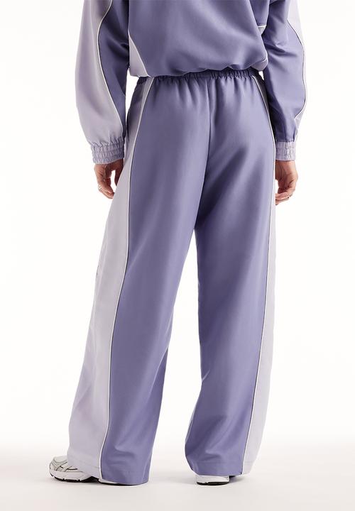 New Balance  - New Balance Trackside Pant - Dark Smoked Violet