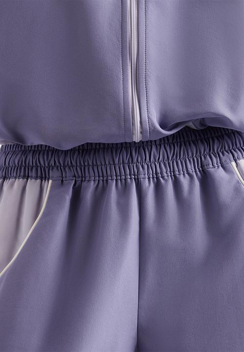 New Balance  - New Balance Trackside Short - Dark Smoked Violet