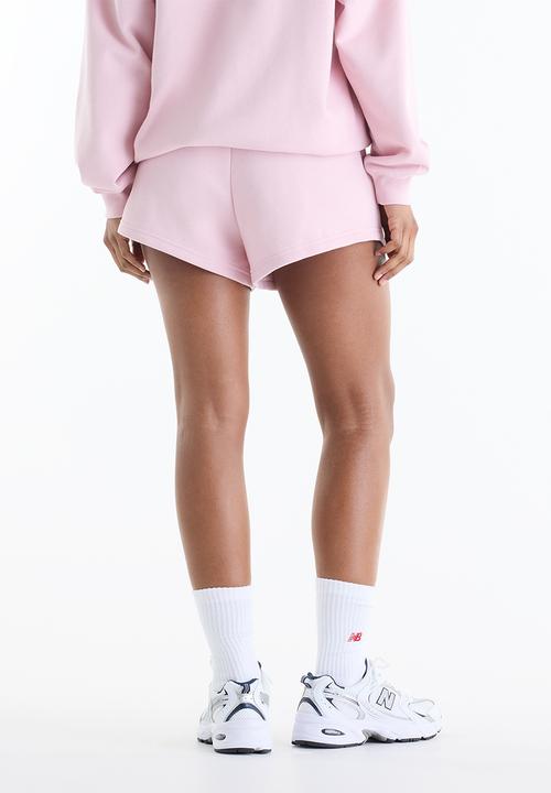 New Balance  - New Balance Trackside French Terry Short - Pink Chalk