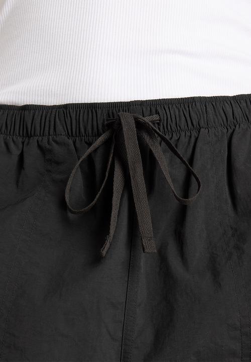New Balance  - NB Athletics Cargo Pant - Black