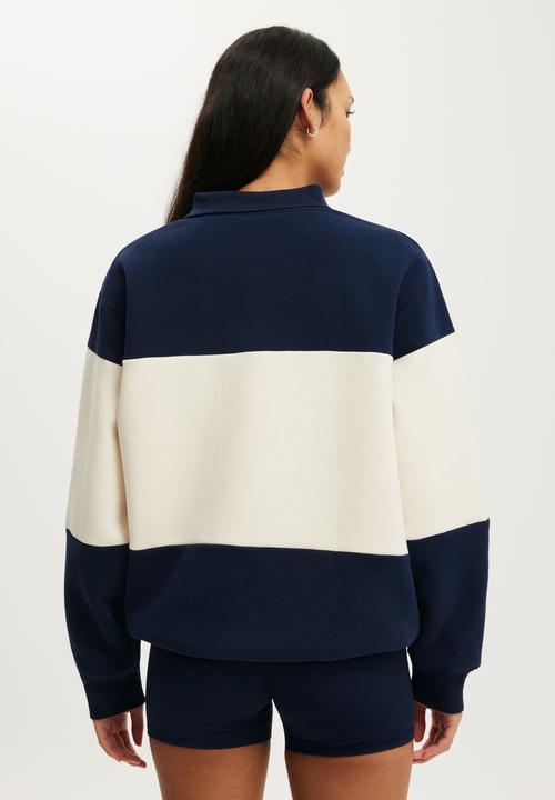 Cotton On - Plush Graphic Rugby Sweatshirt - Prep Sport Navy/Bwc