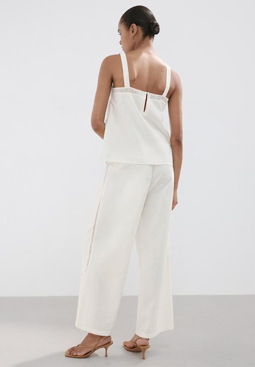 MANGO - Trousers daria - natural