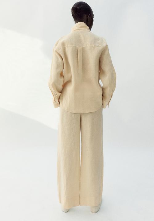 MANGO - Trousers lino - light/pastel yellow
