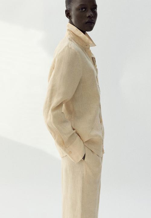 MANGO - Trousers lino - light/pastel yellow