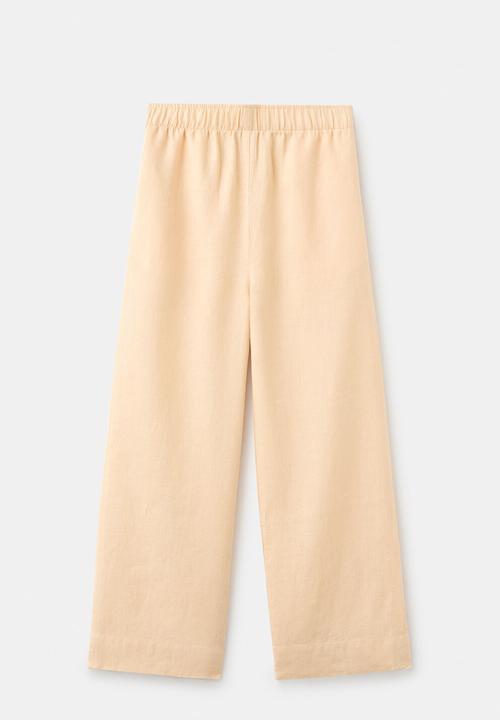 MANGO - Trousers lino - light/pastel yellow