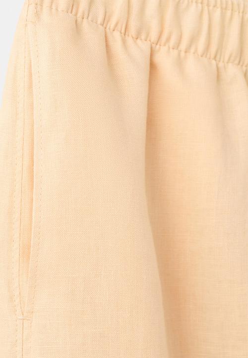 MANGO - Trousers lino - light/pastel yellow