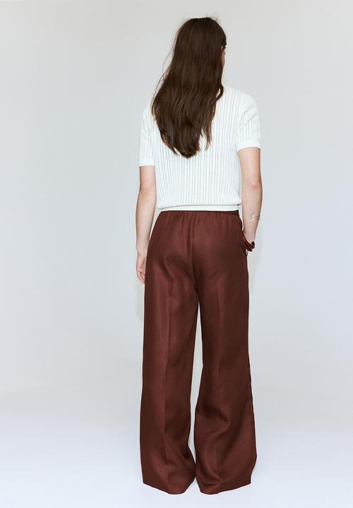 MANGO - Trousers fluid - medium orange