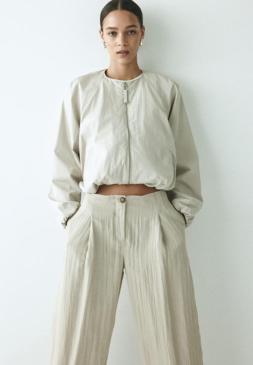 H&M - Crinkled barrel-leg trousers - light beige