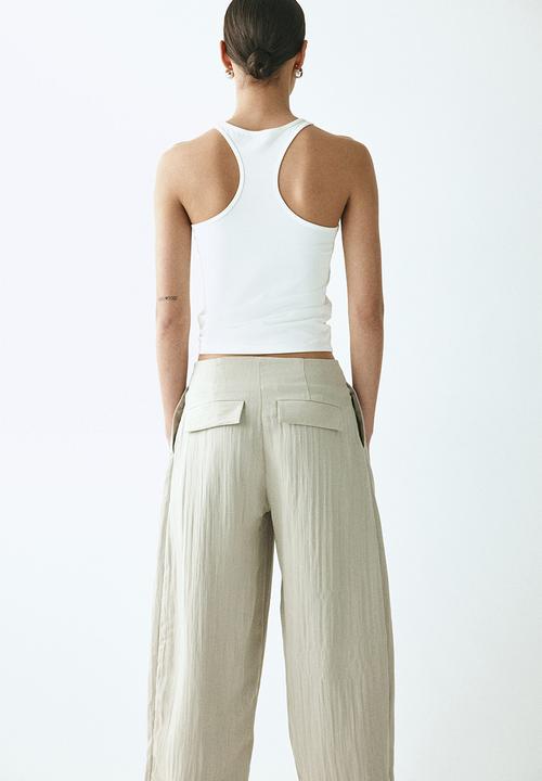 H&M - Crinkled barrel-leg trousers - light beige