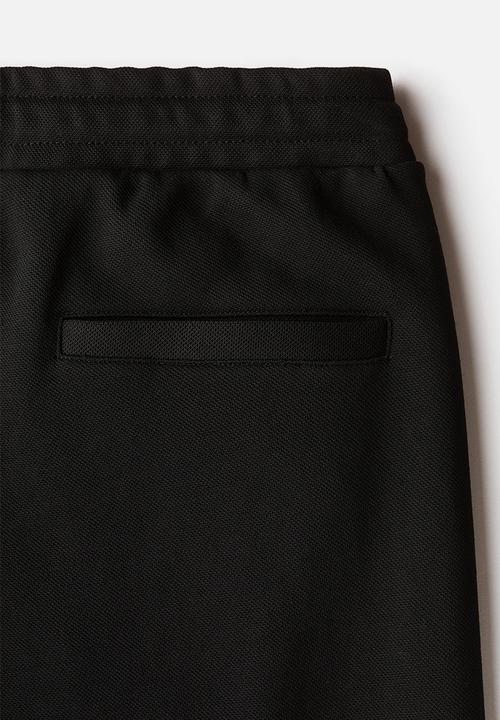 H&M - Regular fit tailored joggers - black