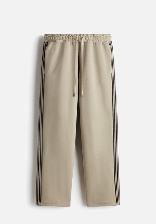 H&M - Loose fit sports joggers with drymove™ - beige