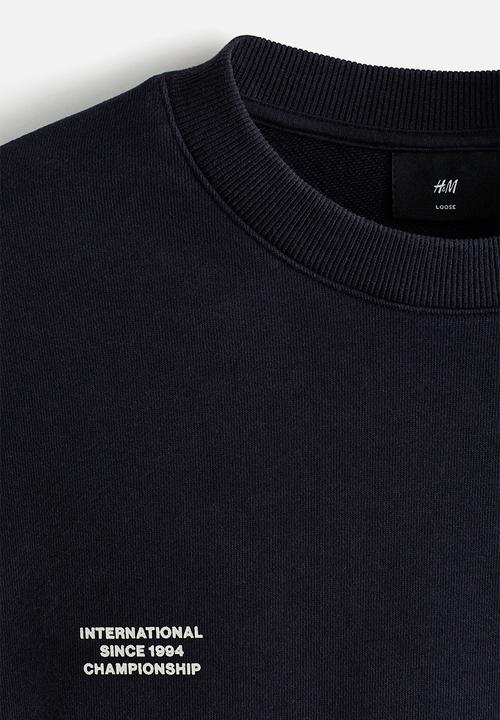 H&M - Loose fit printed sweatshirt - dark blue/intl. 94