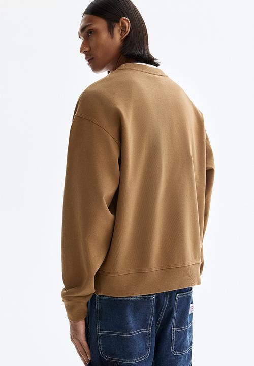 H&M - Loose fit printed sweatshirt - dark beige/soho nyc