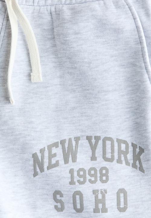 H&M - Printed joggers - light grey marl/new york