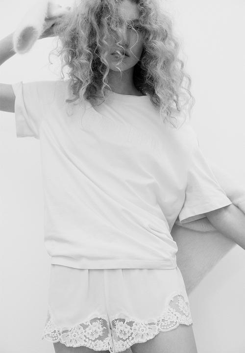 H&M - Oversized T-shirt - light yellow/atelier