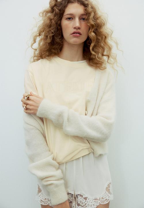 H&M - Oversized T-shirt - light yellow/atelier