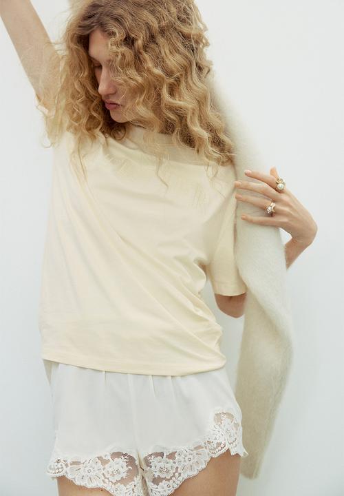 H&M - Oversized T-shirt - light yellow/atelier