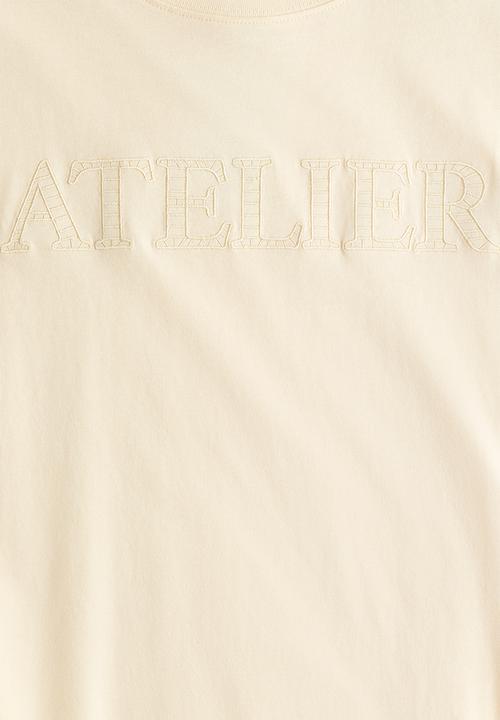 H&M - Oversized T-shirt - light yellow/atelier