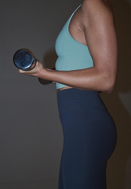 H&M - Seamless sports top with drymove - light turquoise