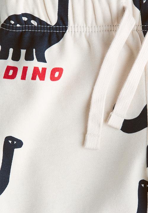 H&M - Printed joggers - light beige/dinosaurs