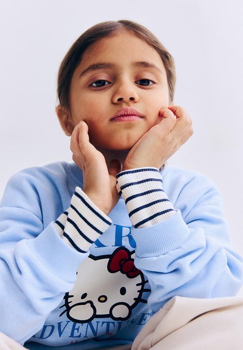 H&M - Printed sweatshirt - light blue/hello kitty