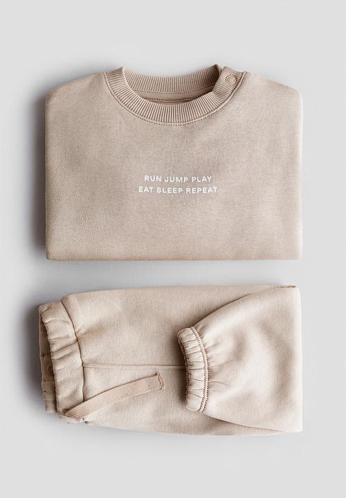 H&M - 2-Piece printed sweatshirt set - light beige/run jump play