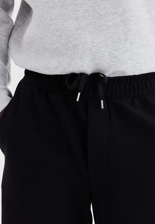 H&M - Regular fit joggers - black