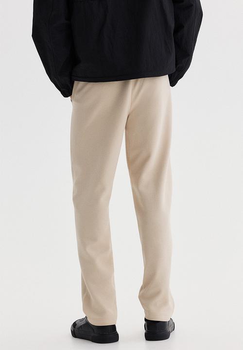 H&M - Regular fit joggers - light beige