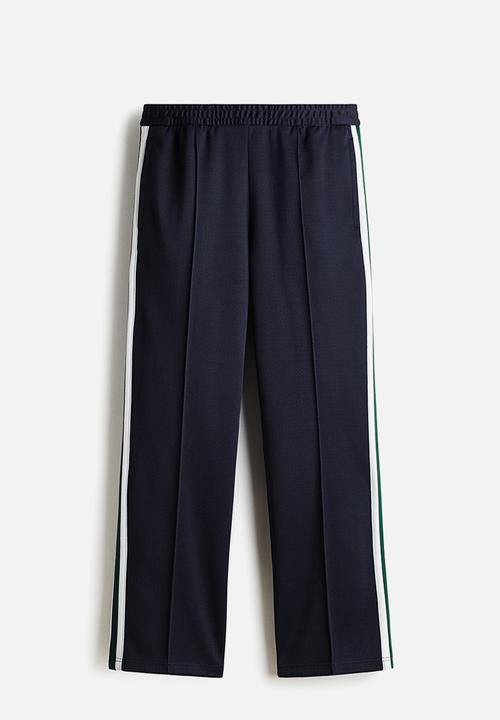 H&M - Relaxed fit track pants - navy blue/stripes