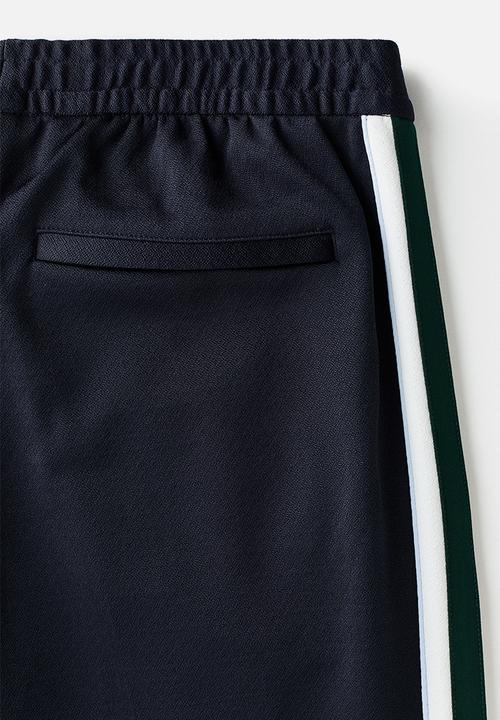 H&M - Relaxed fit track pants - navy blue/stripes