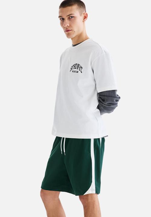 H&M - Regular fit track shorts - dark green/colour block