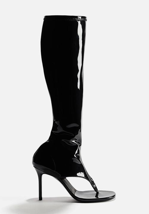 H&M - WARDROBE.NYC H&M:  Cut-out leather sock boots - black