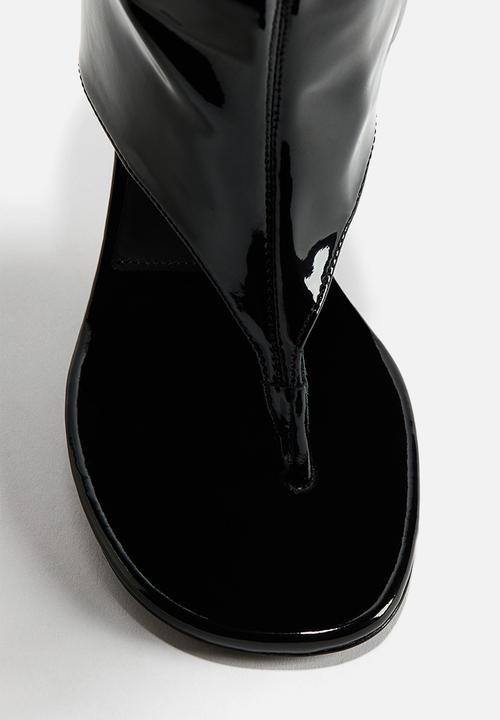 H&M - WARDROBE.NYC H&M:  Cut-out leather sock boots - black