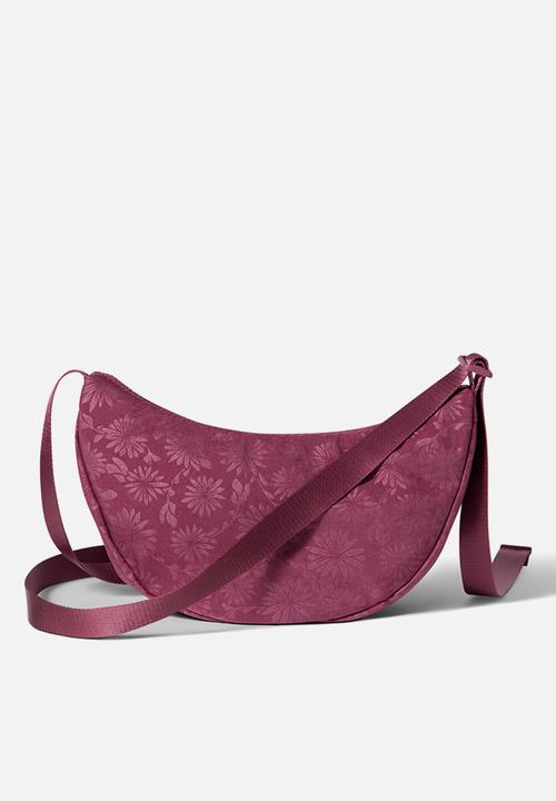 Nike - Aura crescent floral embossed crossbody bag - pink smoke