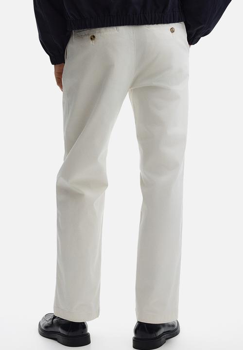 H&M - Relaxed fit cotton chinos - white