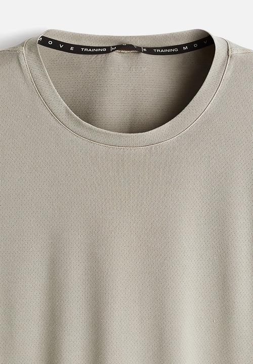 H&M - Running t-shirt with drymove. - dark beige