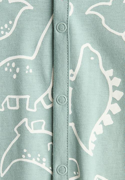 H&M - Patterned sleepsuit - light turquoise/dinosaurs