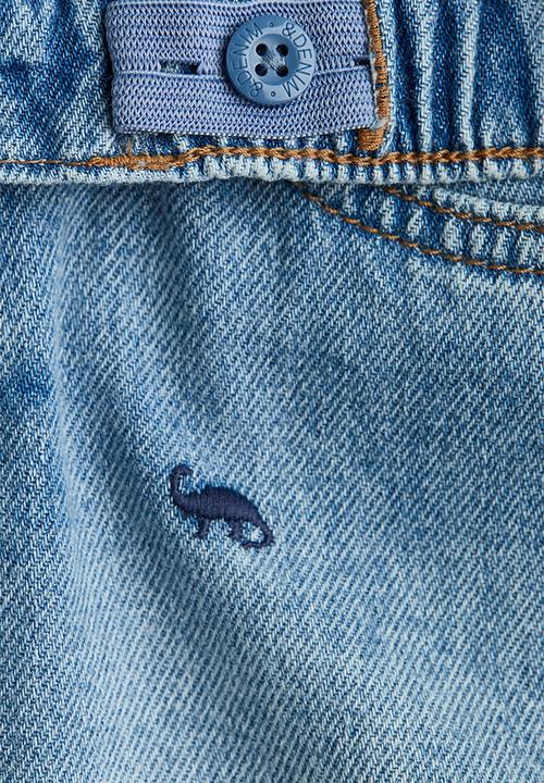 H&M - Loose fit jeans - light denim blue/dinosaurs