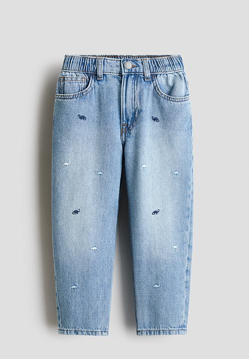 H&M - Loose fit jeans - light denim blue/dinosaurs