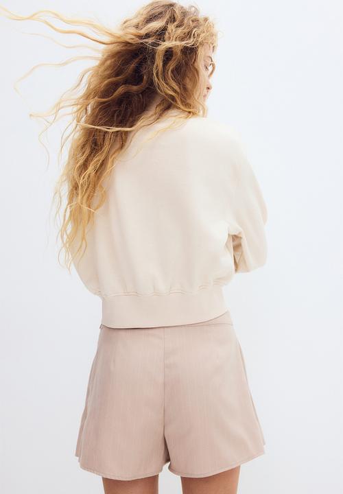 H&M - Pleated twill skort - beige/pinstriped