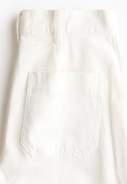 H&M - Straight leg high waist jeans - white/leopard print