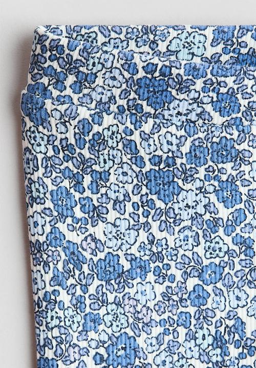 H&M - Flared leggings - light blue/floral