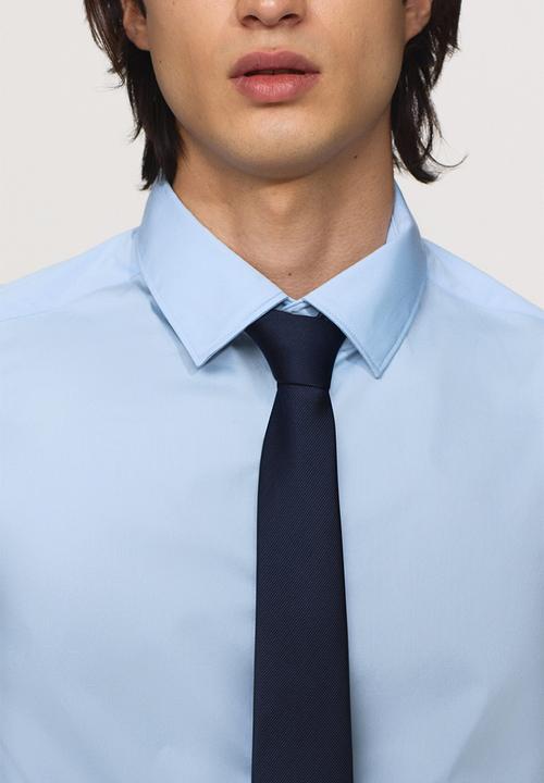 H&M - Slim fit stretch shirt - light blue
