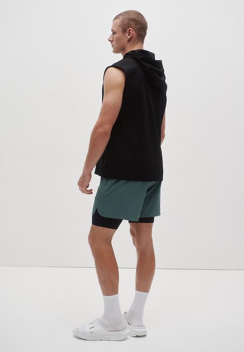 H&M - Double-layered sports shorts with drymove? - dusty green