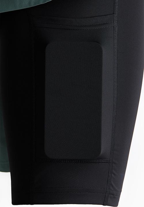 H&M - Double-layered sports shorts with drymove? - dusty green