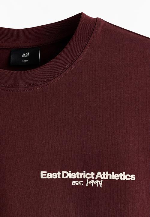 H&M - Loose fit printed t-shirt - burgundy/athletics