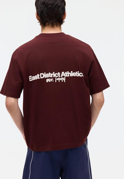 H&M - Loose fit printed t-shirt - burgundy/athletics